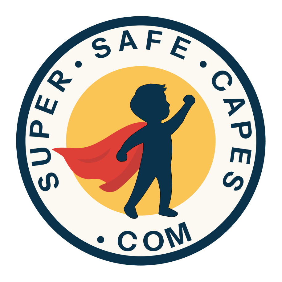 Child wearing an under-arm, neck-free Super Safe Cape — handmade kids superhero cape